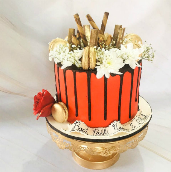 Red and Golden Macrons Cake