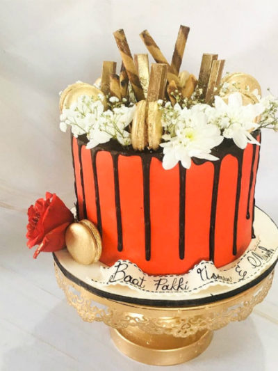Red and Golden Macrons Cake