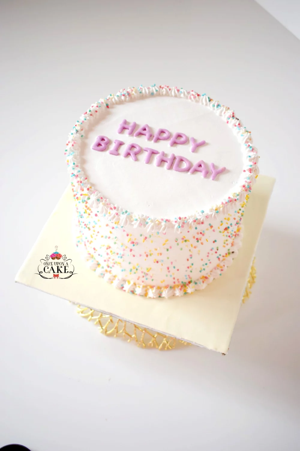 White Cream Sprinkled Cake