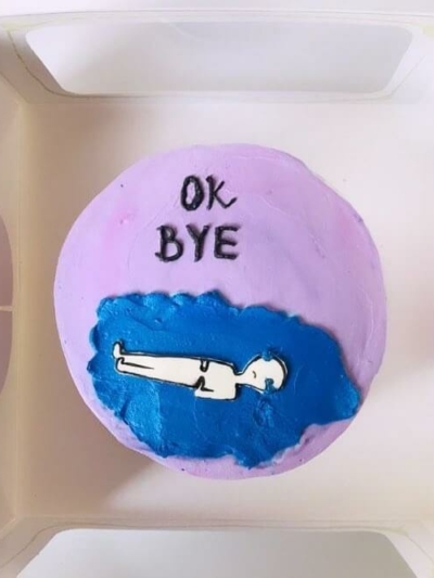 bento cake with ok bye written on it