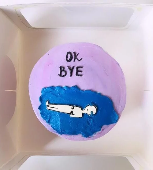 bento cake with ok bye written on it